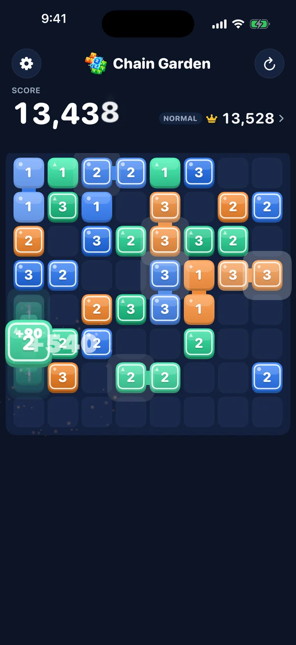 A busy 8×8 board of numbered blue, green and orange tiles.